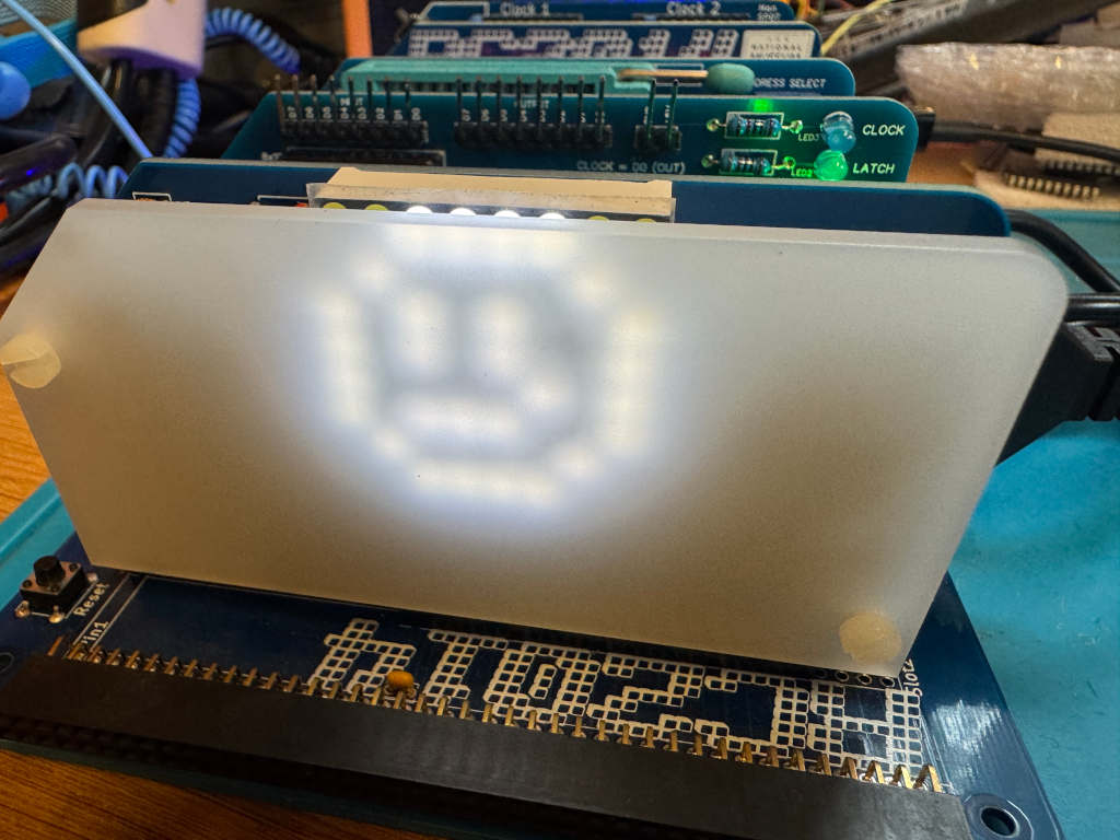 A smiley face drawn on an LED matrix using an RC2014 computer